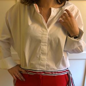 White button down shirt with dolman sleeves.